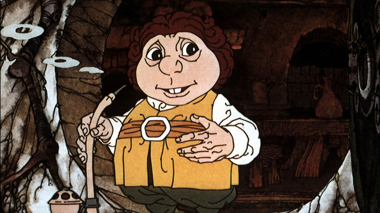 Bilbo stands in front Bag End