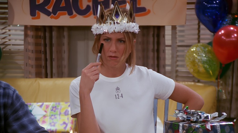 Rachel wearing party hat