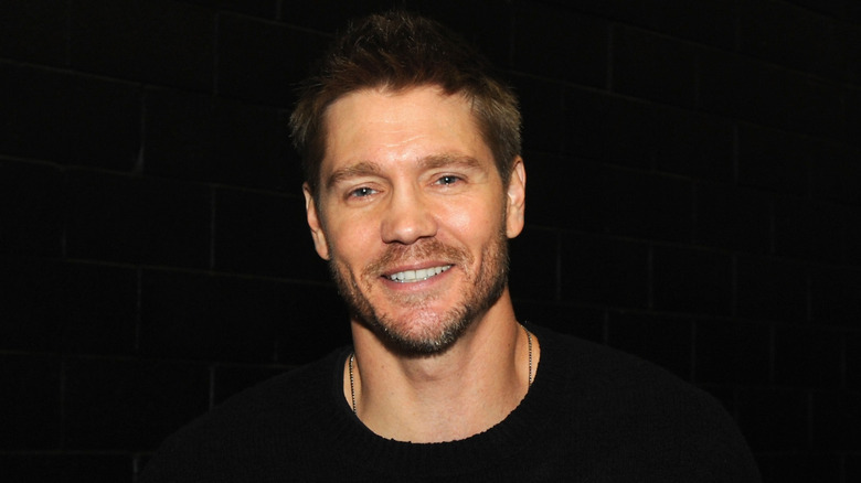 Chad Michael Murray smiling wearing black