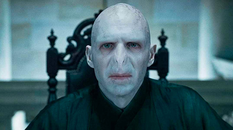 Voldemort sat at table