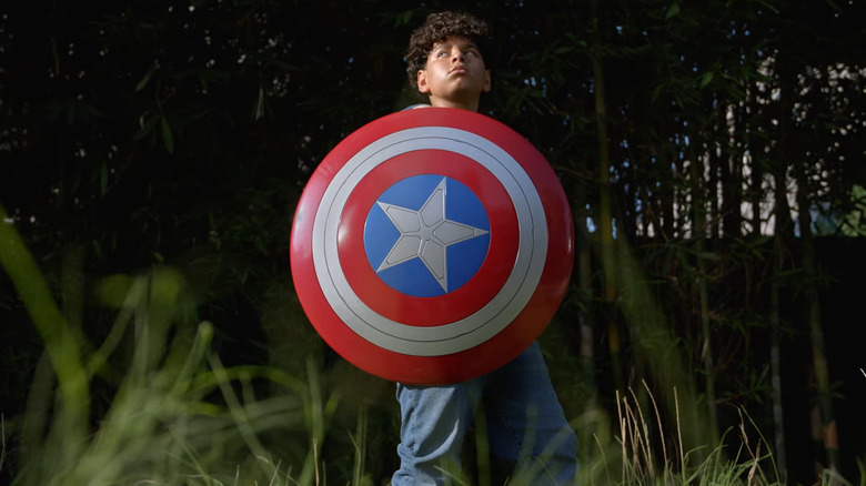 Boy with Captain America shield
