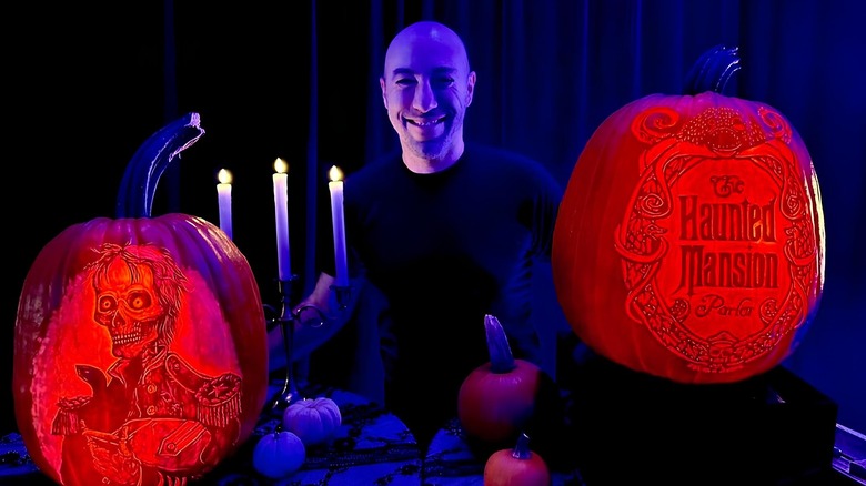 Marc Evan poses with pumpkins